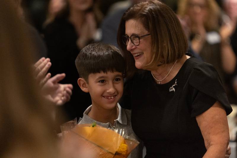 Martha Sanchez is surprised by family after being rewarded the  Wood award at the Geneva Chamber of Commerce Awards Dinner on Thursday, Nov. 6,2025 in Geneva.