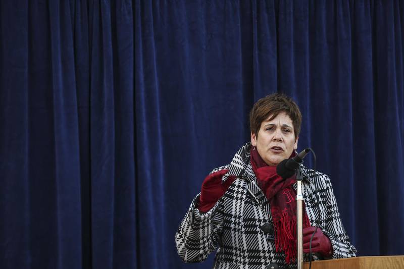 Jennifer Bertino-Tarrant addresses a small crowd which assembled to watch her swearing in ceremony on Monday, Dec. 7, 2020, at the Will County Office Building in Joliet, Ill.