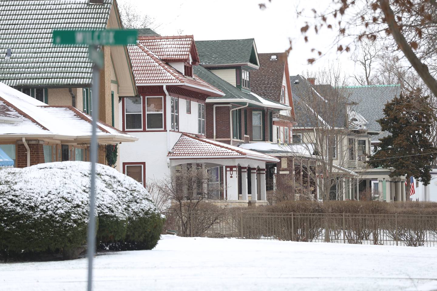Homes sit along a road in a historical district in Joliet on Monday, March 16, 2026.