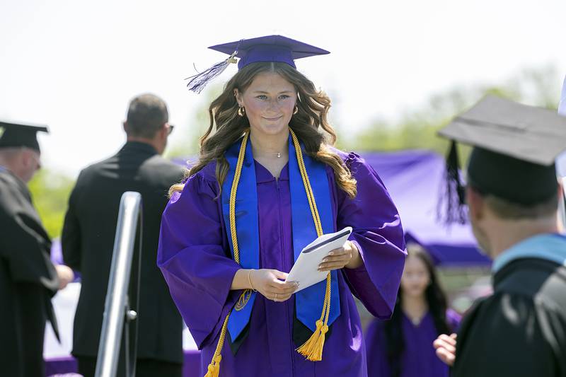 Kamryn Rogers leaves the stage Sunday, May 24, 2026, after receiving her diploma from Dixon High School.