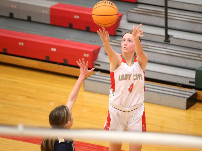 L-P's Aleus Hines shoots a jump shot over Marquette's Kaitlyn Davis on Saturday, Jan. 4, 2025 in Sellett Gymnasium at L-P High School.