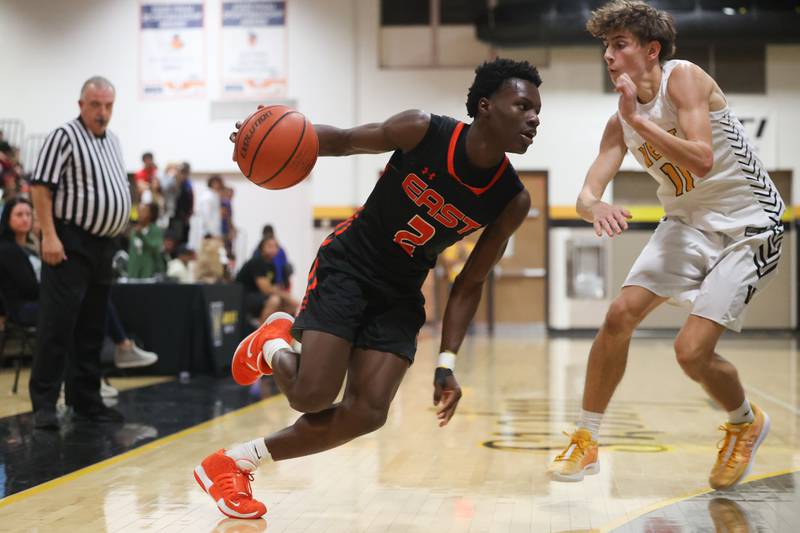 Plainfield East’s Ehi Ognomo makes a move to the baseline against Joliet West on Friday, Dec. 8th, 2023 in Joliet.