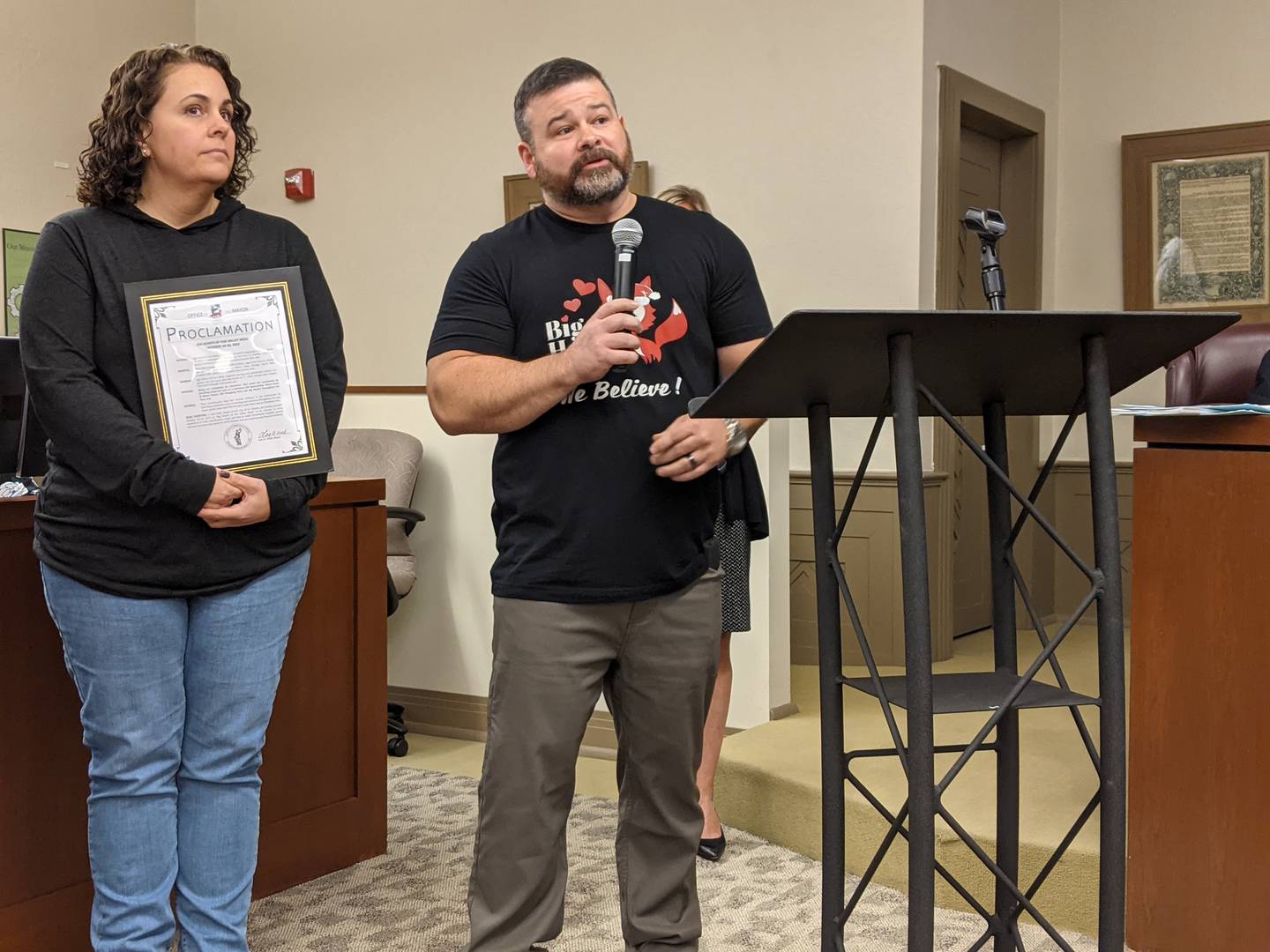 Jennifer Mobley, left, the president and founder of Big Hearts of Fox Valley was at Monday’s St. Charles City Council with her husband, Minor, right, to accept the proclamation.
