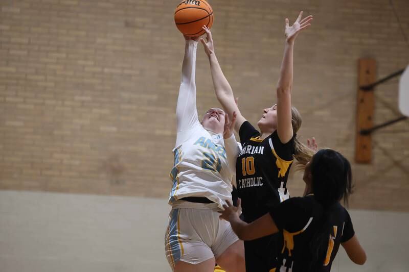 Joliet Catholic’s Emma Birsa puts up a shot against Marian Catholic on Monday, Dec. 9, 2024 in Joliet.