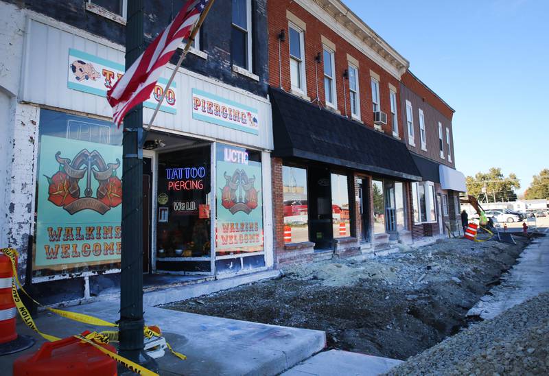 Crews remove chunks of a sidewalk at the corner of Jefferson and Main Street on Monday, Oct. 27, 2025 in Mendota. The City of Mendota is reconstructing sidewalks to comply with ADA accessibility. The project includes 2,100 square feet of sidewalk, 184 feet of curb and gutter, asphalt patching and other miscellaneous improvements.