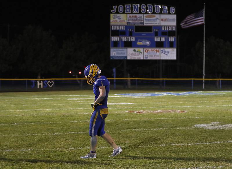 Johnsburg's Jake Metze walks off the field after Johnsburg’s loss to Rochelle in a IHSA Class 4A second round playoff football game Friday, Nov. 4, 2022, at Johnsburg High School in Johnsburg.