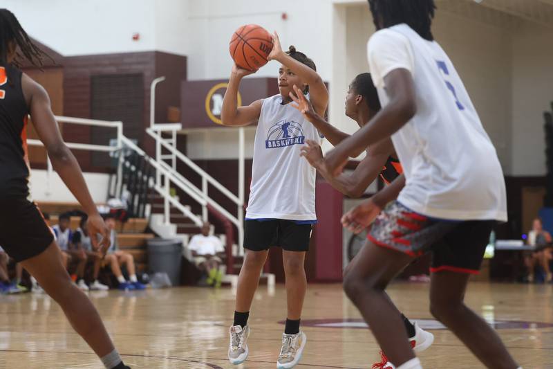 Joliet Central’s Mikey Stokes puts up the three against DeKalb at the 37th Morris Boys Shootout on Tuesday, June 25, 2024.