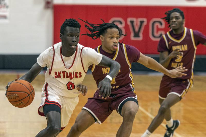 Sauk Valley College’s Atem Agot handles the ball against Indian Hills Monday, Jan. 30, 2023.