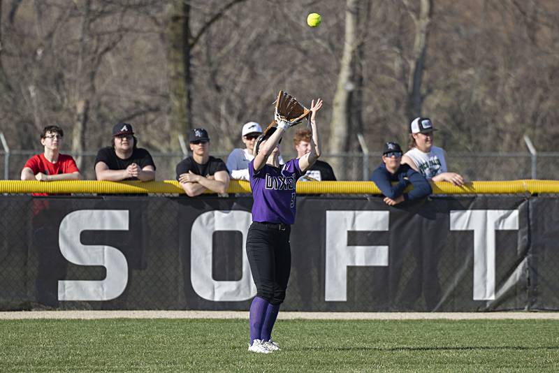 Dixon’s Delaney Bruce hauls in a fly ball in left field against Rock Falls Tuesday, April 11, 2023.