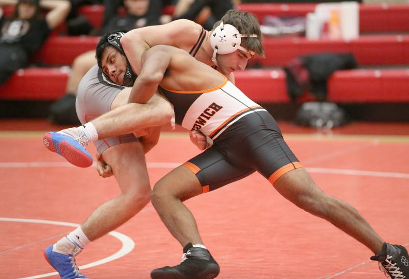 Ottawa's Marek Duffy wrestles Sandwich's on Thursday, Jan. 12, 2023 in Kingman Gymnasium at Ottawa High School.