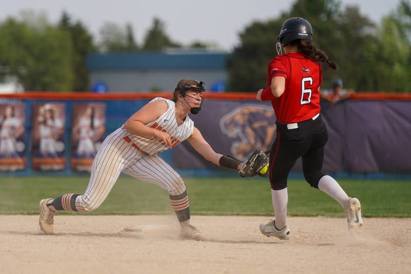 Oswego’s Kennedy Gengler tags Yorkville's Bri Tuttle (6) for an out on during a softball game at Oswego High School on Thursday, May 15, 2025.