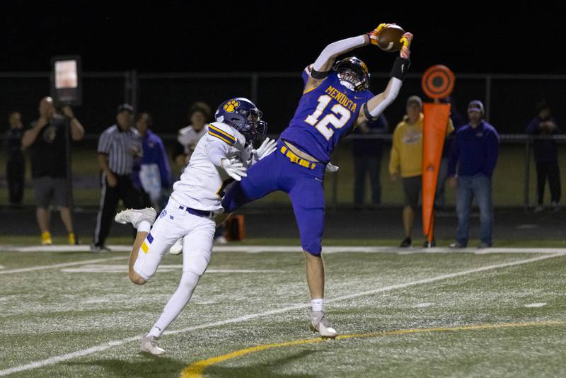 Braiden Freeman stretches out for a leaping grab to bring in the football and score a touchdown against Sherrard at Mendota High School on September 27, 2024.