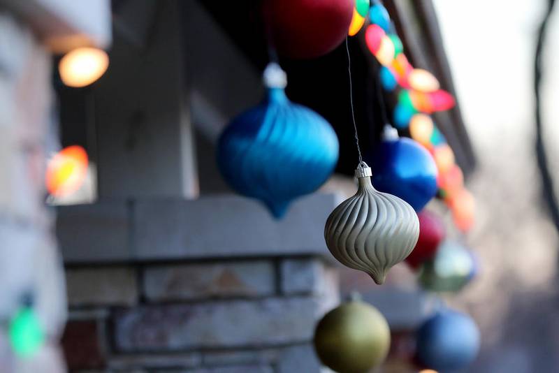 Holiday decorations sway in the wind after the lights are turned on at the start of the Holiday Night Hike at Veteran Acres Park on Friday, Dec. 4, 2020 in Crystal Lake.  The event was rebranded from a one-night "Luminaria Walk" event to a 6-night "Holiday Night Hike" to allow for better social distancing to avoid a crowded one-night event.