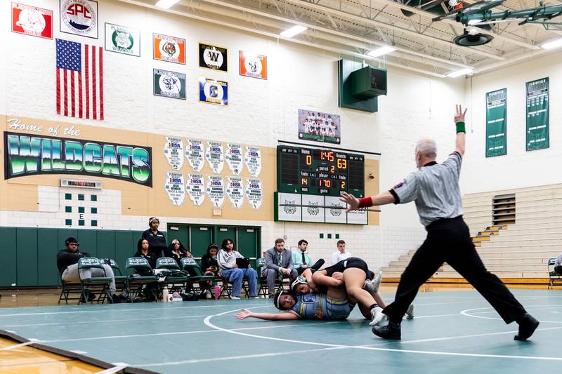 Plainfield Central's Alicia Tucker takes on Gianna Guerroro of Joliet Central in the 170-pound match at Plainfield Central on January 13, 2025.