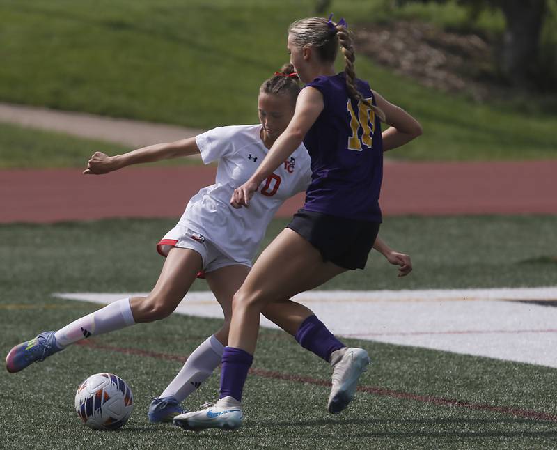 Timothy Christian's Brooklynn Bunn tries to keep the ball away from Williamsville's Ella Plumb in the IHSA Class 1A State Girls Soccer third-place match on Friday, June 6, 2025, at North Central College in Naperville.