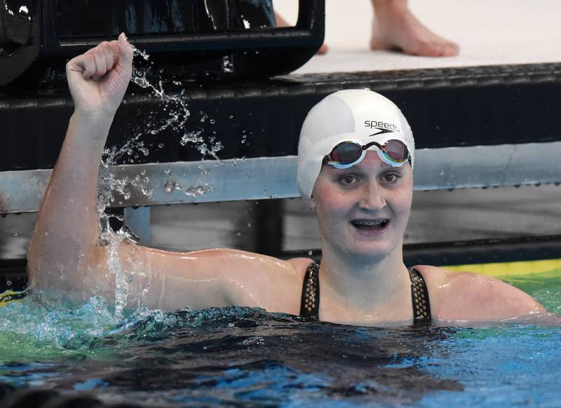 Yorkville Christian’s Emma Overall celebrates after winning the consolation heat of the 200-yard freestyle during the IHSA girls state swimming finals at FMC Natatorium in Westmont on Saturday, Nov. 12, 2022.