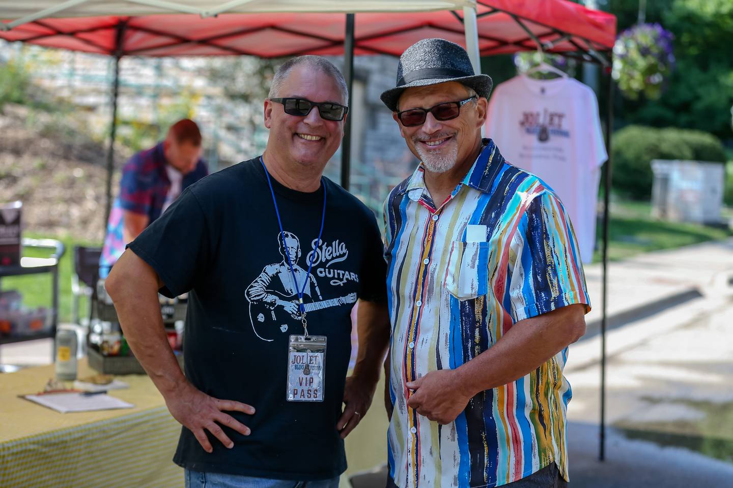 Karl Maurer (left) and John Simpson, vice president of Billie Limacher Bicentennial Park board enjoy the Joliet Blues Festival at Bicentennial Park. Aug 13, 2022.