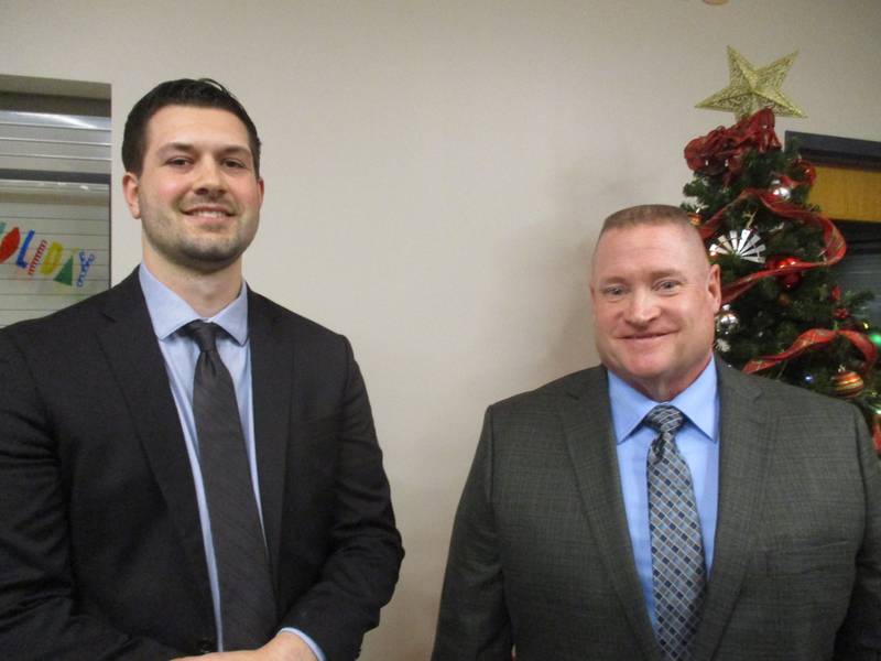 Alexander Buhler, left, and Gary Michaels are experienced law enforcement officers who have joined the Batavia Police Department. They were sworn in at the Dec. 4 Batavia City Council meeting. (Mark Foster)