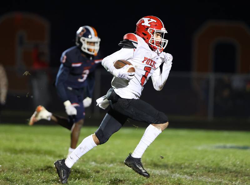 Yorkville’s Dom Coronado (1) runs the ball during the boys varsity football game against Oswego on Friday, Oct. 6, 2023 in Oswego.