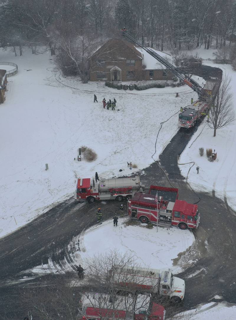 Firefighters work the scene of a structure fire on Friday, Jan. 10, 2025 at a residence located in the 2500 bock of East 1569th Road (Covel Bluff Lane) in Ottawa. The fire was upgraded to the second alarm. Firefighters from Oglesby, Utica, Grand Ridge, Marseilles, Tonica and others assisted with the fire.