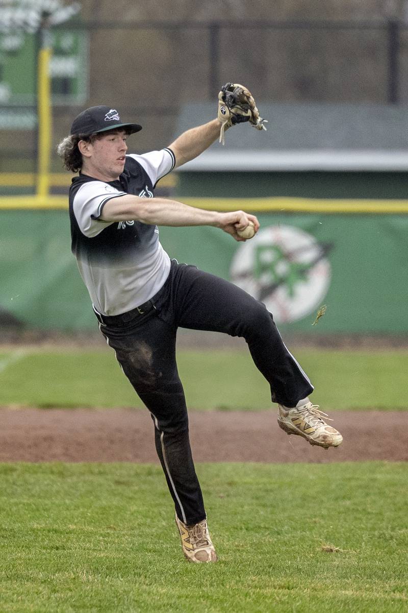 Rock Falls’ Carter Hunter holds onto the ball after sprinting in to field a ball against Dixon Thursday, April 9, 2026.