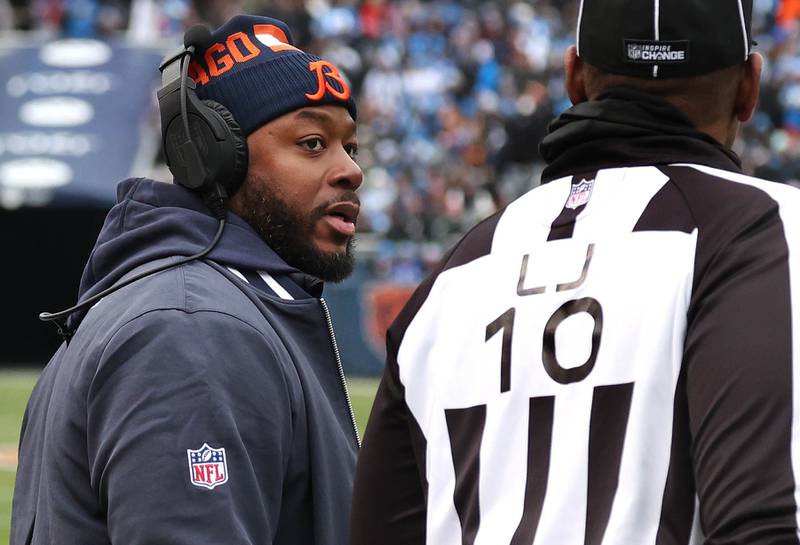 Chicago Bears interim head coach Thomas Brown talks to an official late in the first half of their game against the Detroit Lions Sunday, Dec. 22, 2024, at Soldier Field in Chicago.