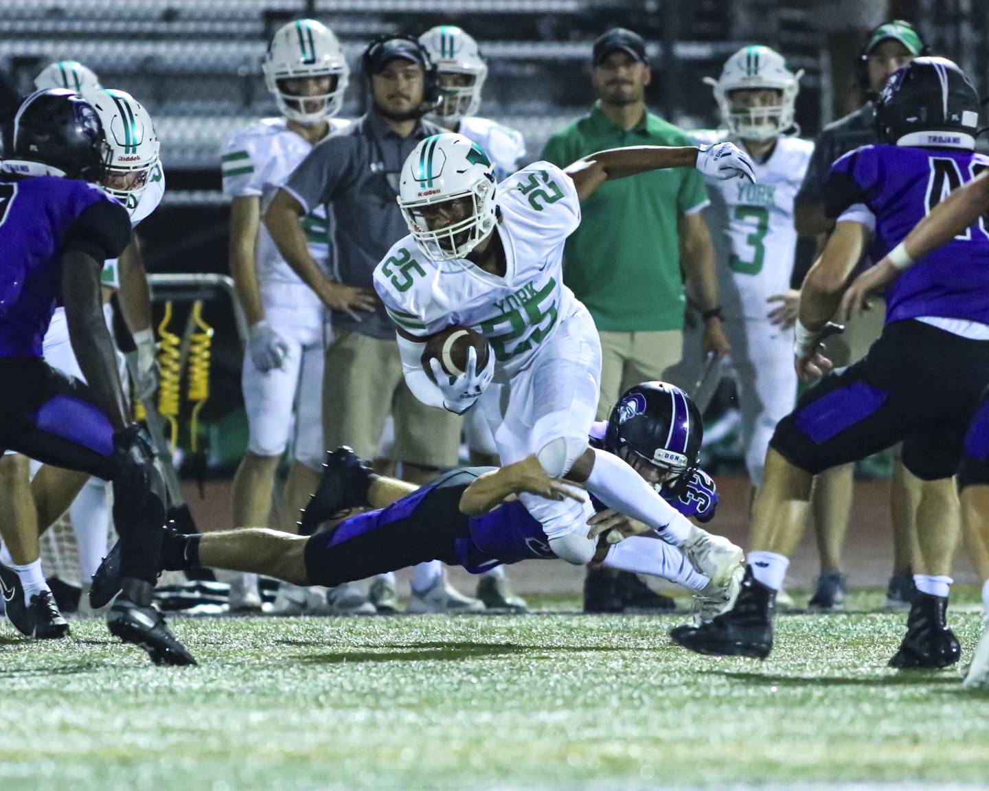 York's Kal Harris (25) runs after a short catch during football game between York at Downers Grove North.  Sept 17, 2021.