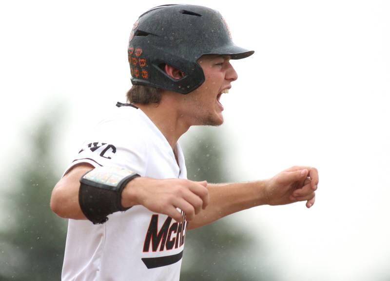 McHenry’s Connor McLean gets revved up after scoring on a bases loaded walk in sectional final baseball action at Hampshire Saturday. The game against Huntley was suspended due to weather.