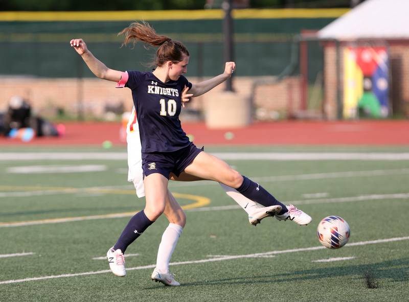 IC Catholic's Ashley Zwolinski (10) fights for the ball during the IHSA Class 1A girls soccer super-sectional match between Richmond-Burton and IC Catholic at Concordia University in River Forest on Tuesday, May 23, 2023.