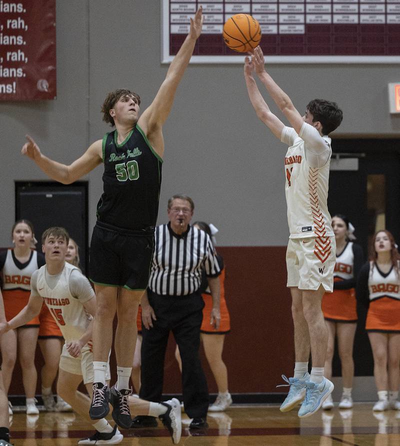 Rock Falls’ Cole Mulnix puts a block on Winnebago’s Aidan Shumate turned the ball back to the Rockets with just seconds left Tuesday, March 4, 2025, during the 2A boys basketball Sectional final at Marengo.