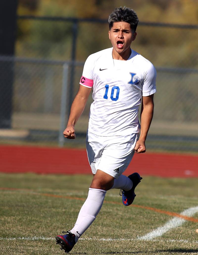 Larkin’s Adrian Diaz sprints away after scoring a first-half goal against Huntley in boys soccer regional action at South Elgin on Saturday.