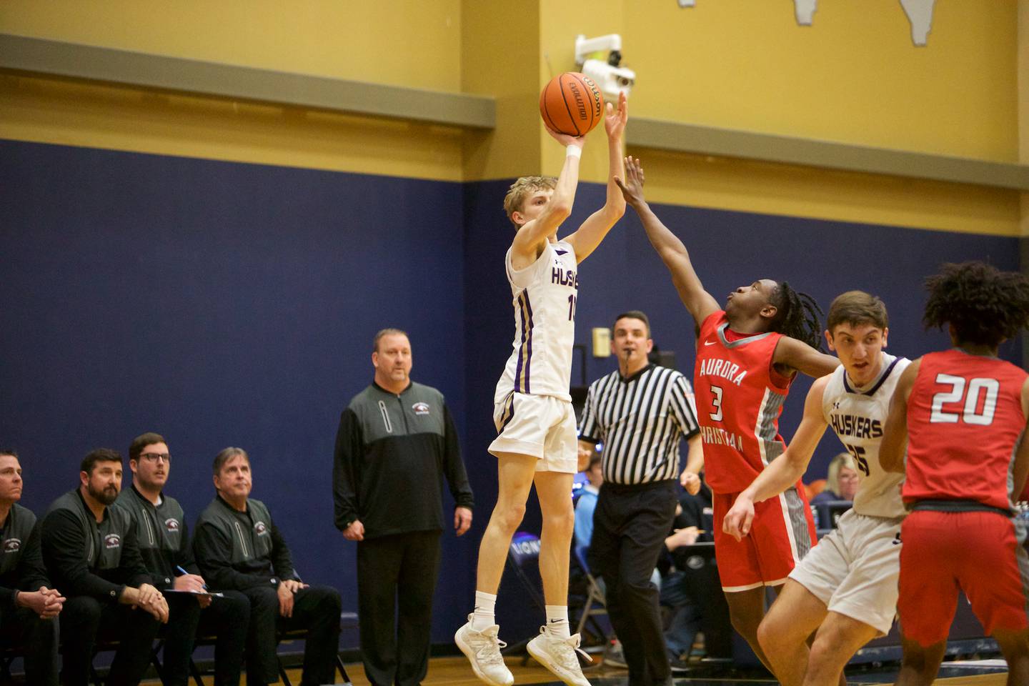 Serena's Carson Baker puts the shot up over Aurora Christian's Marshawn Cocraft during the Class 1A Harvest Christian Sectional championship game Friday, March 1, 2024, in Elgin.