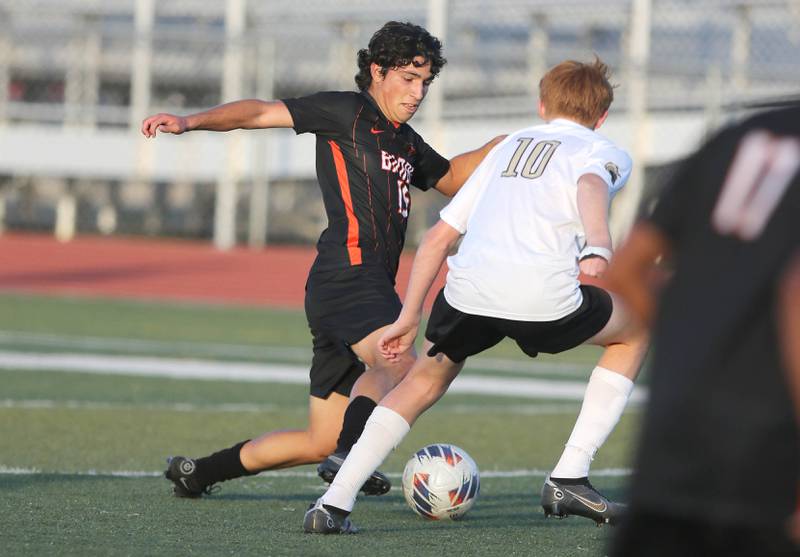 DeKalb's Aaron Tierney tries to get by Sycamore's Jameson Carl during their game Tuesday, Oct. 4, 2022, at DeKalb High School.