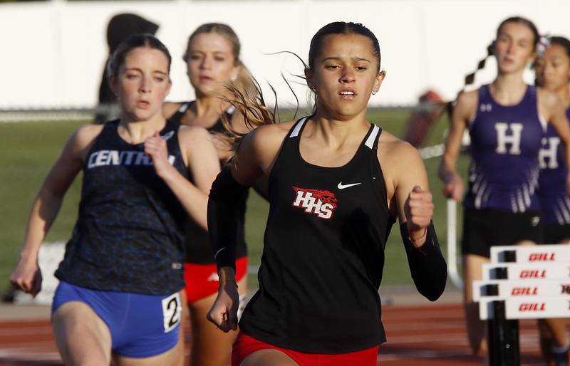 Huntley’s Haley Rahman (center) competes in the 800 meter run on Thursday, May 7, 2026, during the Fox Valley Conference Girls Track and Field Meet at Huntley High School.