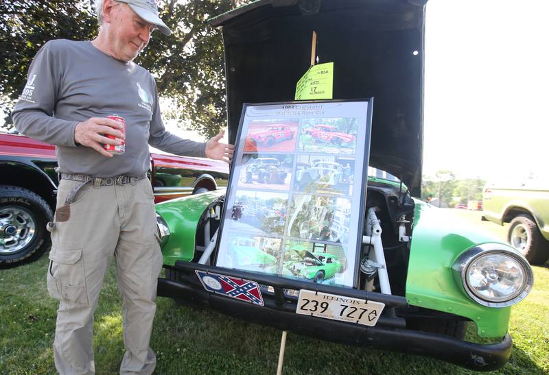 Larry Kohr of La Salle shows off his Volkswagen Super Convertible during the Utica Fire Department Car Show on Saturday, June 21, 2025 at Carey Memorial Park in Utica.