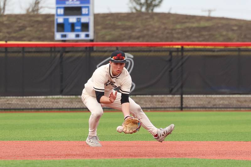 Bradley-Bourbonnais' Jace Boudreau fields a grounder to shortstop during the Boilermakers' 8-7 loss to Homewood-Flossmoor on Monday, April 13, 2026.