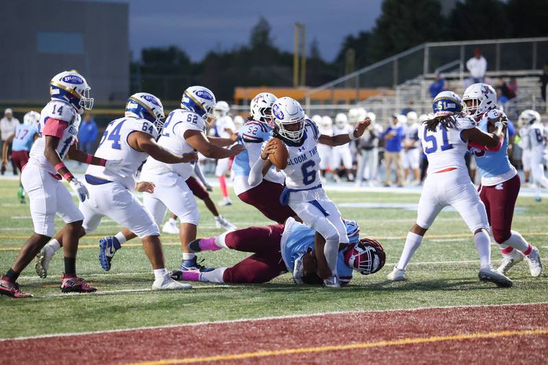 Kankakee's Jyheir Sutton gets the sack on Bloom' quarterback Isaiah Dunlap during the Kay's victory over Bloom on Friday, Oct. 10, 2025.