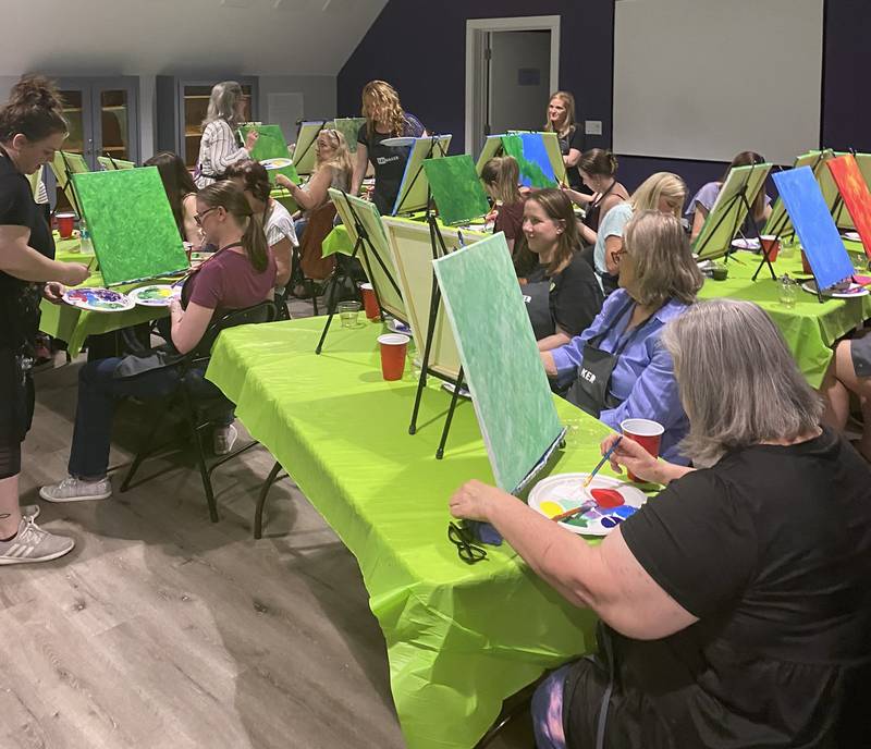 Participants enjoy a 2023 Paint & Sip Night! event presented by the Lombard Historical Society.