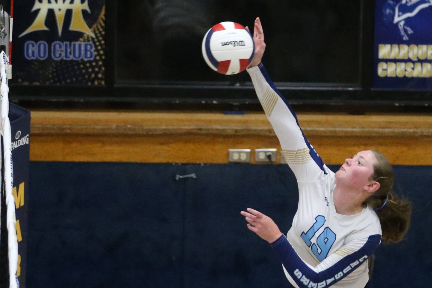 Marquette's Kelsey Cuchra spikes the ball against Newark on Wednesday, Aug. 27, 2025 in Bader Gymnasium.
