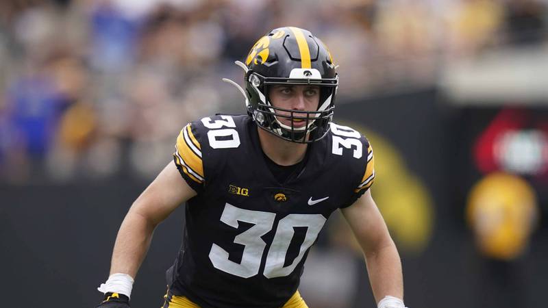 Iowa defensive back Quinn Schulte gets set for a play during an NCAA college football game against South Dakota State, Saturday, Sept. 3, 2022, in Iowa City, Iowa. (AP Photo/Charlie Neibergall)