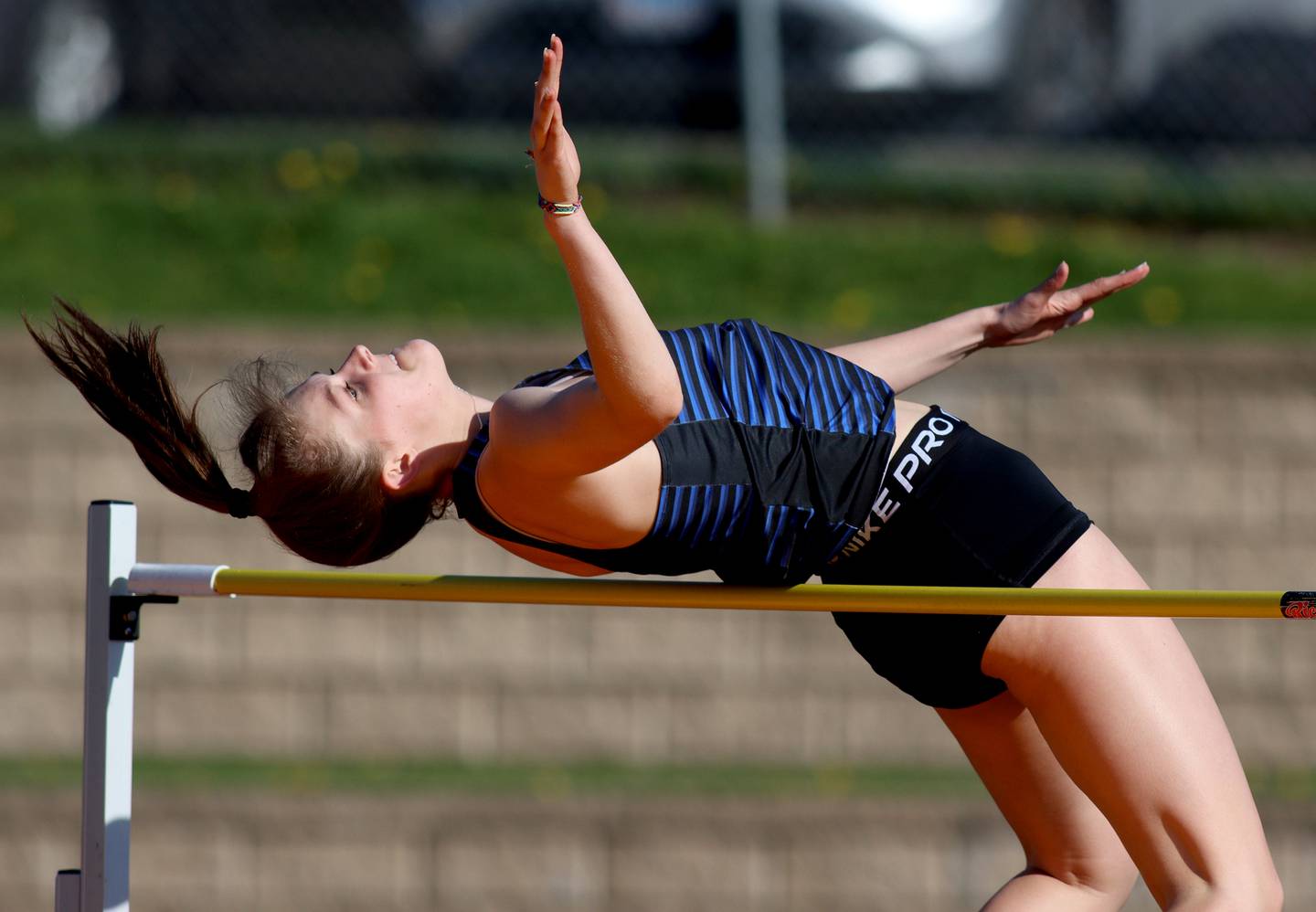 Hallie Steponaitis of Woodstock competes in the high jump during the Kishwaukee River Conference Girls Conference Championships track meet at Harvard High School Tuesday.