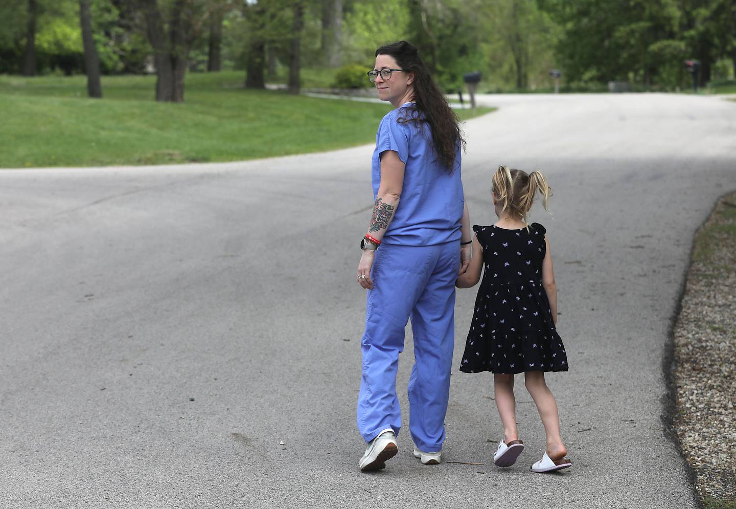 Kailee Schultz, with her daughter on Tuesday, May 19, 2026, at their home in Johnsburg. Schultz was seven months pregnant with her daughter when a patient kicked her in the abdomen while working in the emergency room at Northwestern Medicine in McHenry.