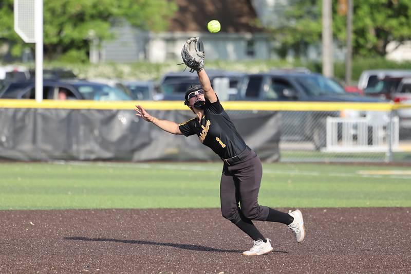 Herscher's Abby Overacker reaches for the ball during the Tigers' 13-6 victory against Central on Wednesday, May 14, 2025.