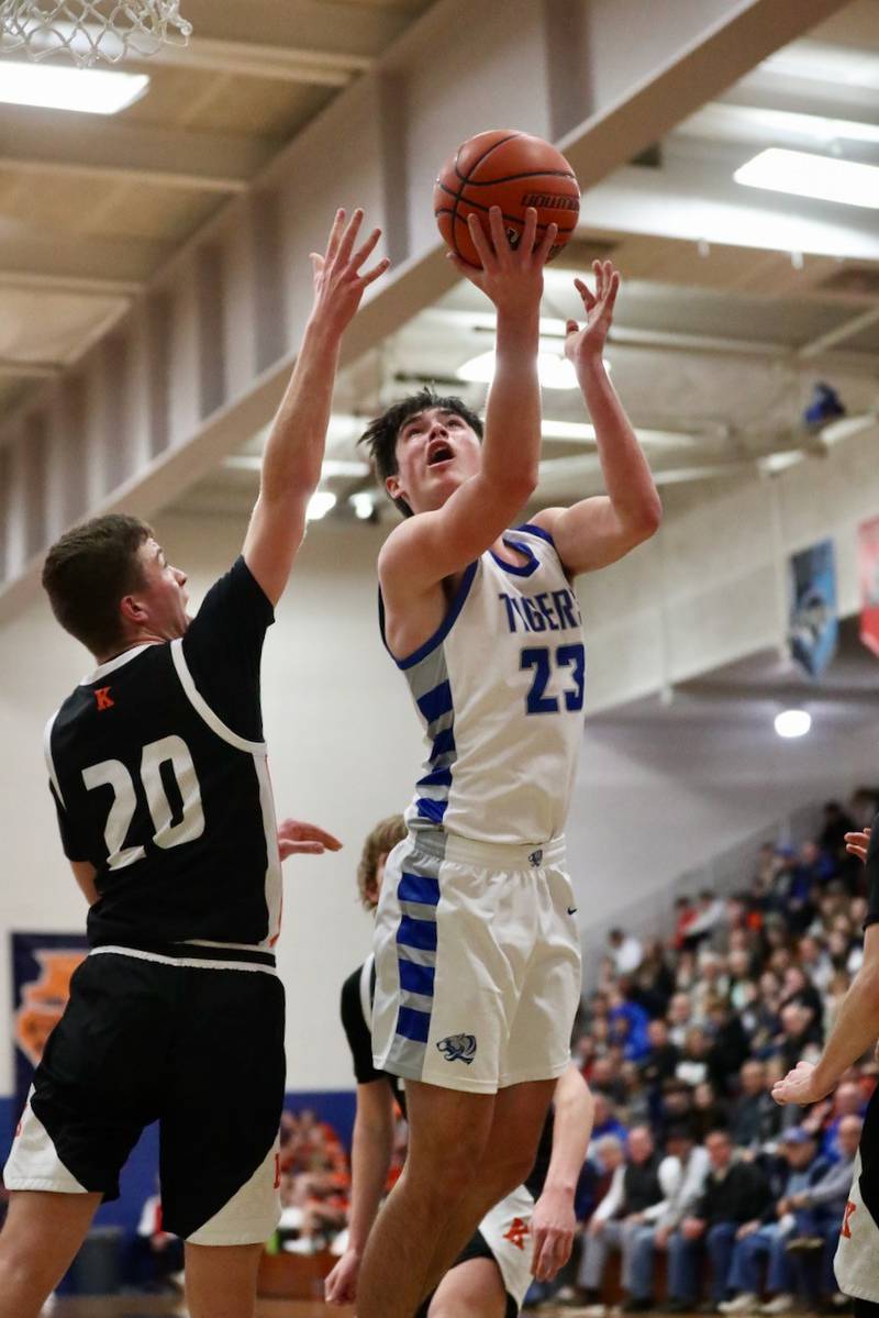 Princeton's Noah LaPorte shoots over Kewanee's Will Rumbold Tuesday night at Prouty Gym. The Tigers won 66-44.