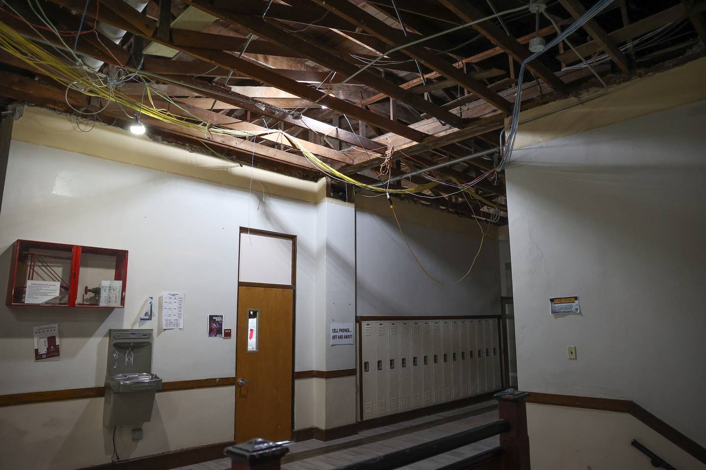 The roof of the 1932 section of the Lockport Township High School Central Campus is exposed after the ceiling was taken down.