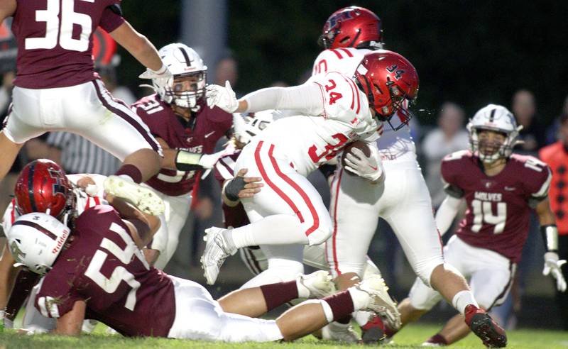 Huntley’s Haiden Janke powers through for a touchdown against Prairie Ridge in varsity football at Crystal Lake Friday night.