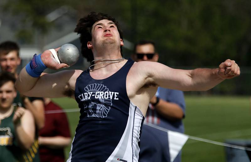 Cary-Grove’s Logan Abrams throws the shot put on Thursday, April 23, 2026, during the McHenry County Track and Field Meet at McCracken Field in McHenry.