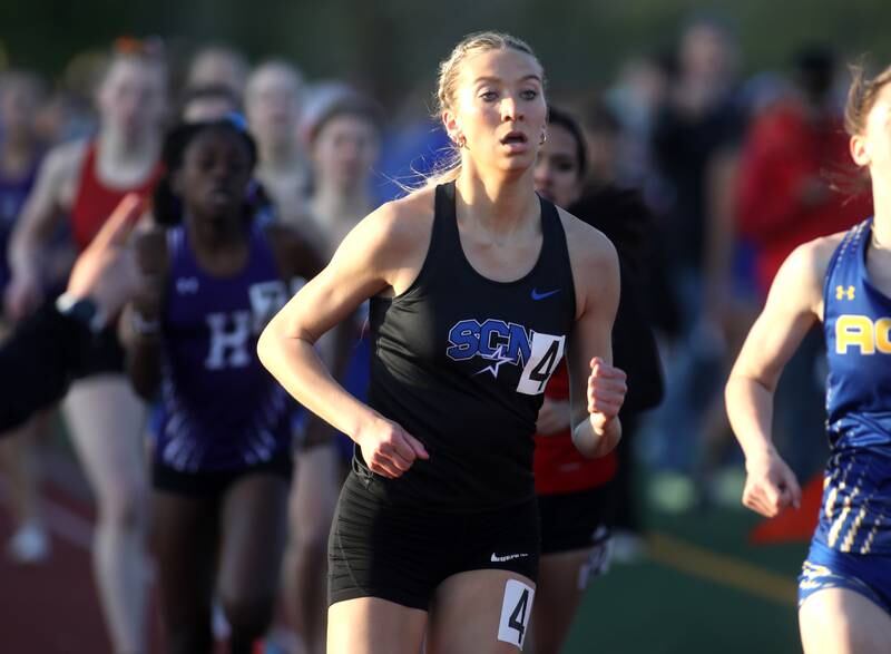 St. Charles North’s Reagan Sipla competes in the 800-meter run during the 2024 Kane County Girls Track and Field meet at St. Charles East on Thursday, April 25, 2024.