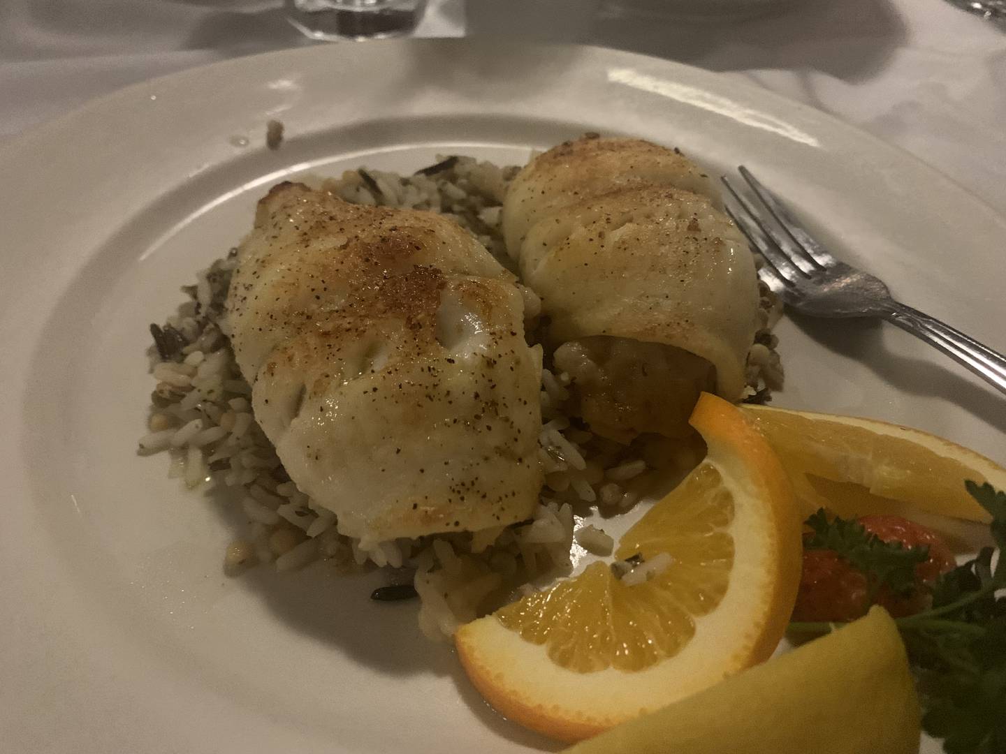The broiled flounder stuffed with crab meat served on a bed of rice is a flavorful, fresh entree choice.
