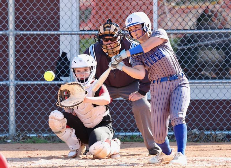 Princeton's Slyvie Rutledge takes her cut at the plate as Hall catcher Caroline Morris awaits the pitch in Thursday's game in Spring Valley. The Tigresses won 12-2 in six innings.